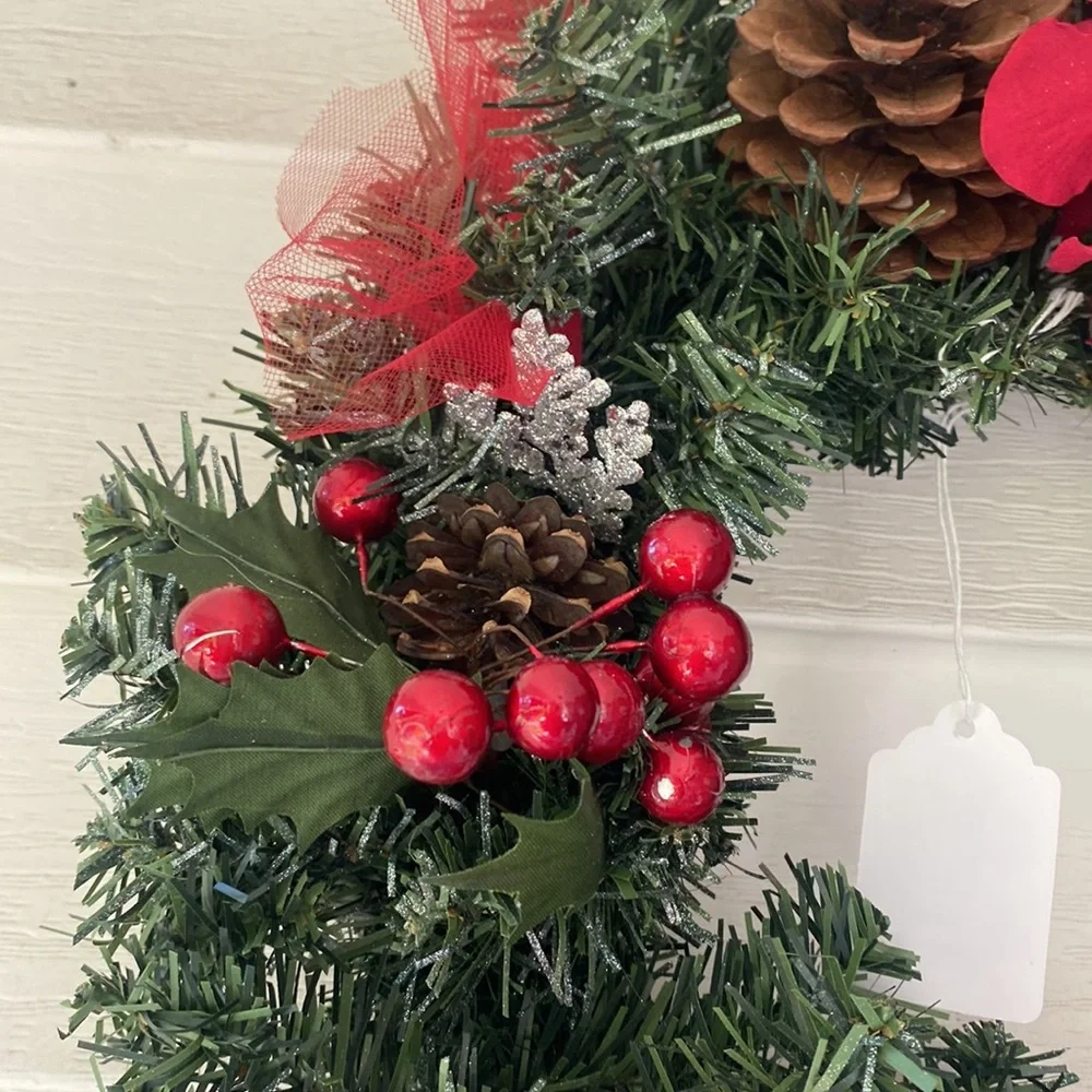 Evergreen Faux Wreath Trimmed with red accents and pine ones